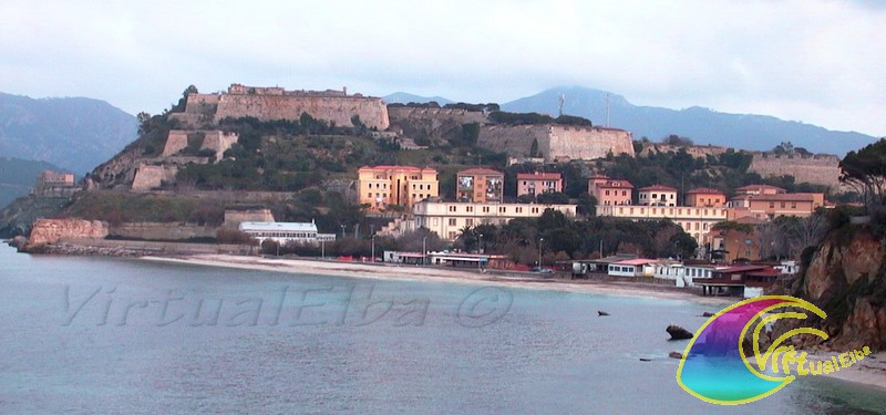 Fortress Falcone walls and Portoferraio beach
