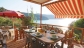 Vista baia della Biodola dalla terrazza dello Chalet De Luxe Elite - Camping Scaglieri Village Biodola